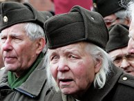 Шествие ветеранов латышского легиона Waffen-SS и их сторонников в Риге Шествие ветеранов латышского легиона Waffen-SS и их сторонников в Риге