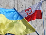Государственные флаги Украины и Польши у посольства Польши в Киеве. Государственные флаги Украины и Польши у посольства Польши в Киеве.