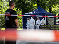 Полицейские осматривают место убийства грузина в Берлине Полицейские осматривают место убийства грузина в Берлине
