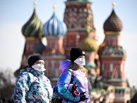 Туристы на Красной площади в Москве Туристы на Красной площади в Москве