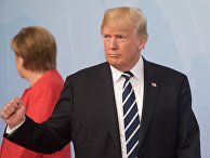 Дональд Трамп на церемонии официальной встречи канцлером Германии Ангелой Меркель глав делегаций государств-участников "Группы двадцати" G20 в Гамбурге. 7 июля 2017 Дональд Трамп на церемонии официальной встречи канцлером Германии Ангелой Меркель глав делегаций государств-участников "Группы двадцати" G20 в Гамбурге. 7 июля 2017