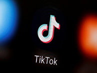 Приложение TikTok на экране смартфона Приложение TikTok на экране смартфона