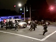 Полиция во время протестов в Портленде Полиция во время протестов в Портленде