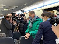 Аэропорт Шереметьево, куда приземлился самолёт с А. Навальным Аэропорт Шереметьево, куда приземлился самолёт с А. Навальным