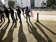 Вооруженные участники акции протеста в США Вооруженные участники акции протеста в США