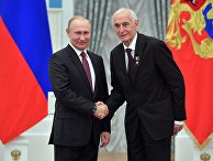 Президент РФ В. Путин вручил медали "Герой Труда Российской Федерации" Президент РФ В. Путин вручил медали "Герой Труда Российской Федерации"