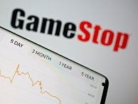 Акции GameStop на экране смартфона Акции GameStop на экране смартфона